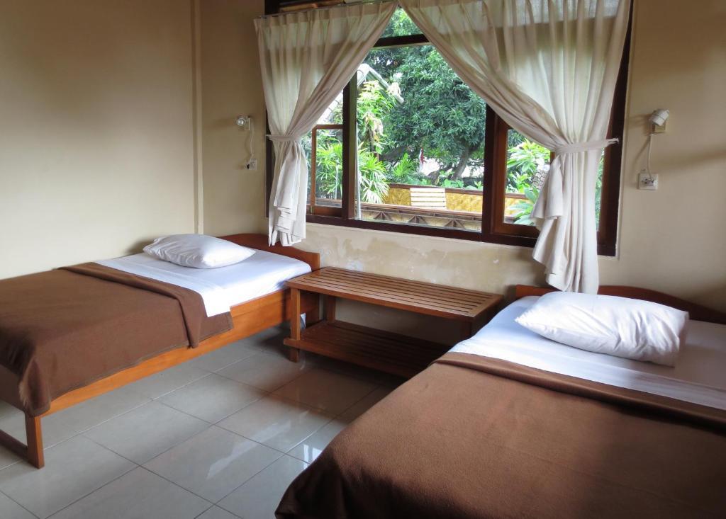 Paradise Palm Beach Bungalows And Dive Center Tulamben Стая снимка