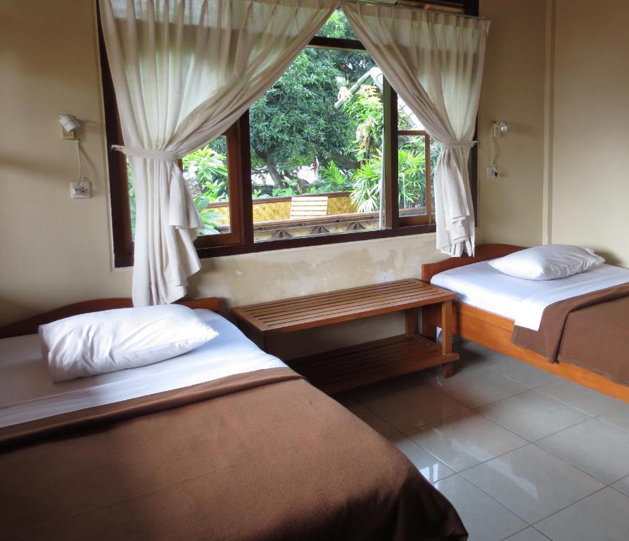 Paradise Palm Beach Bungalows And Dive Center Tulamben Стая снимка